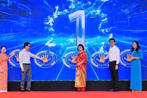 Các đại biểu thực hiện nghi thức khởi động Tuần lễ hưởng ứng học tập suốt đời năm 2026. Ảnh: BCB