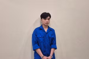 Nguyễn Tuấn Anh tại cơ quan công an. Ảnh: Công an TPHCM.