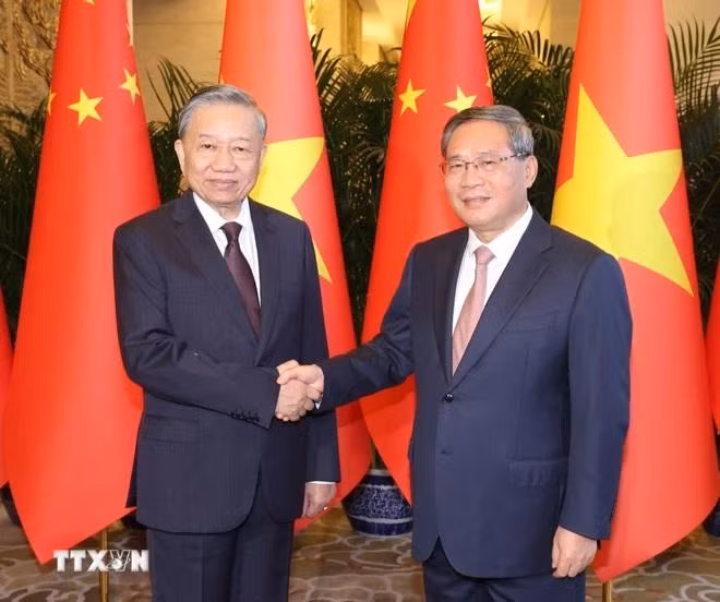 Tong-Bi-thu,-Chu-tich-nuoc-To-Lam-hoi-kien-Thu-tuong-Trung-Quoc-Ly-Cuong-2.jpg