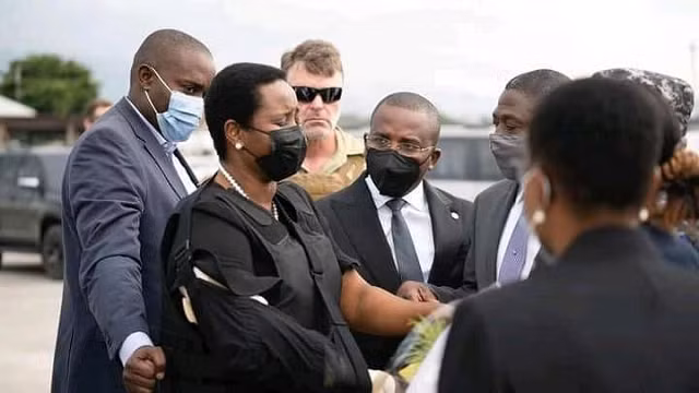Bà Martine Moise từ Mỹ về nước.