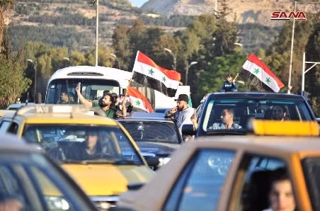 Người dân Syria ủng hộ quân đội và ông Assad Người dân Syria ủng hộ quân đội và ông Assad