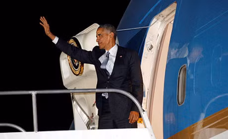 Obama muon dua vo di nghi sau khi roi Nha Trang - Anh 1