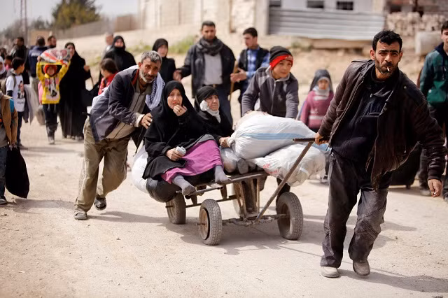 Người dân sơ tán khỏi Đông Ghouta ngày 15/3 Người dân sơ tán khỏi Đông Ghouta ngày 15/3