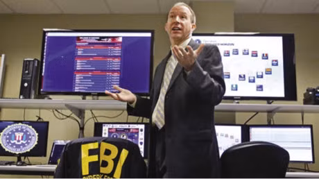 FBI lap chien cong nho thu phap quet vong mac - Anh 1