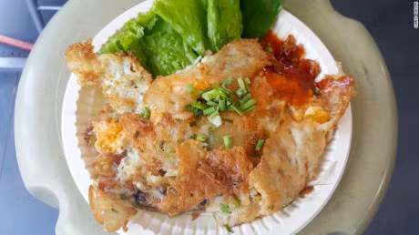 Banh xeo Viet Nam lot top mon an duong pho dang thu nhat The Gioi - Anh 3
