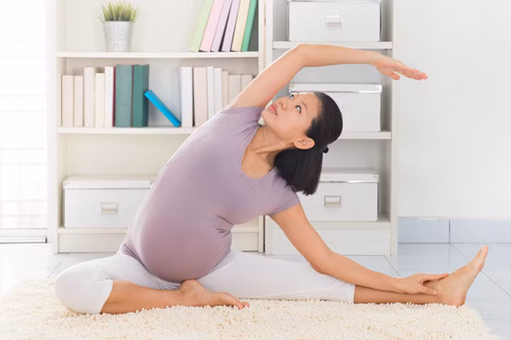 Bí quyết chặn đứng cơn đau lưng ê ẩm khi mang thai
