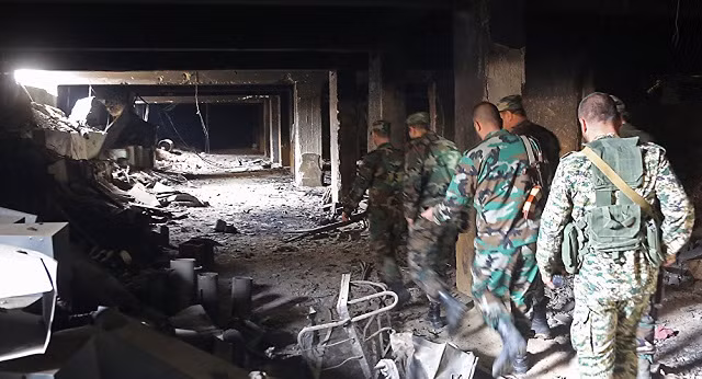 Quân đội Syria kiểm tra đường hầm do quân nổi dậy để lại ở Đông Ghouta
