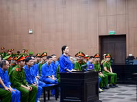 Bị cáo Nguyễn Thị Mai Anh trước bục khai báo. 