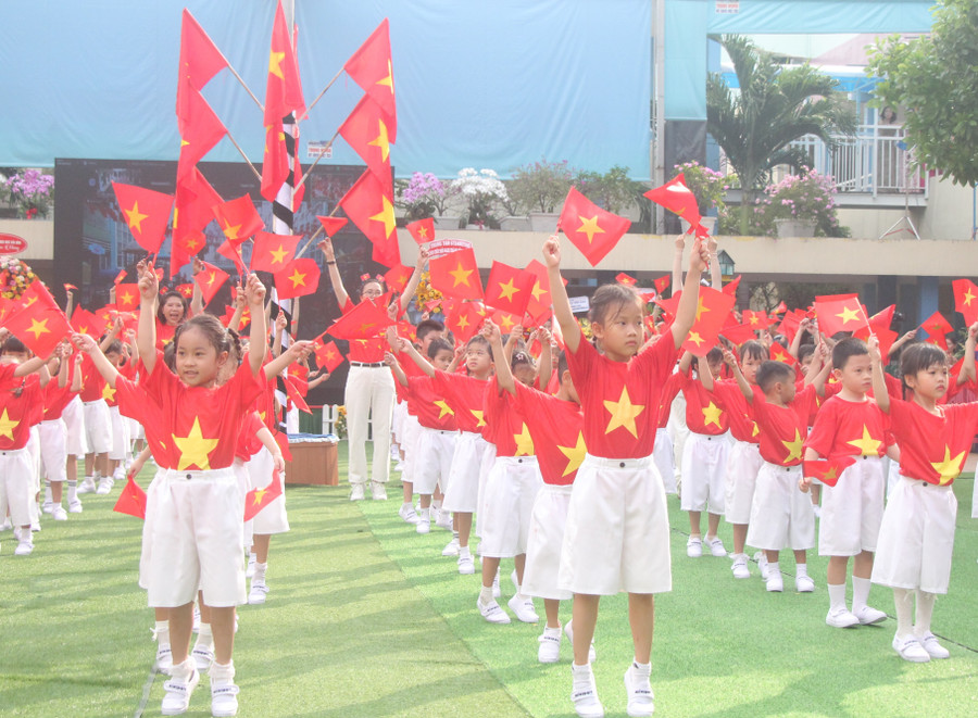 Học sinh Trường Mầm non Thành phố (TPHCM) trong Ngày hội 50 năm phát triển bậc học mầm non.