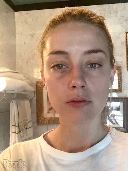 amber heard tung them anh bang chung to johnny depp bao hanh hinh 1