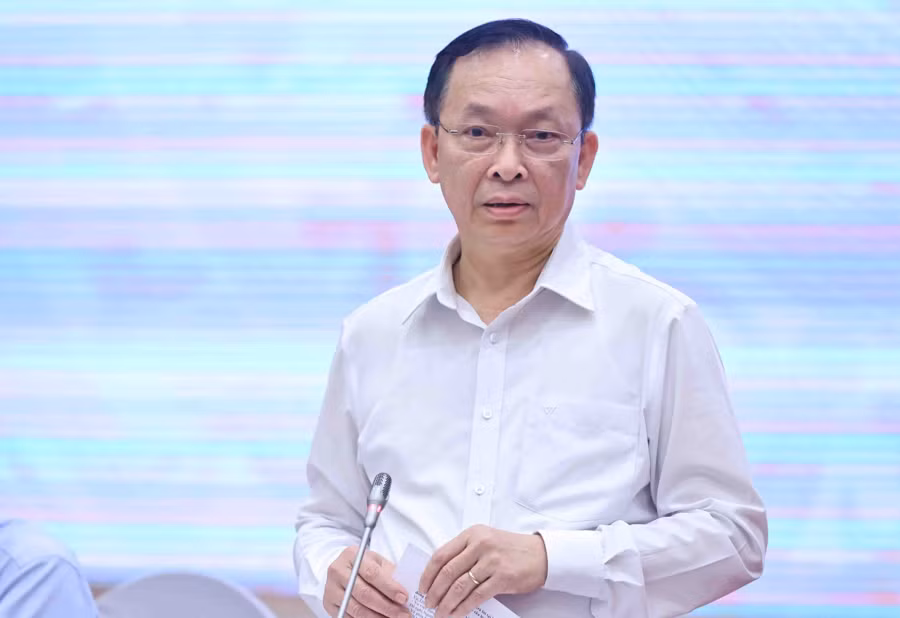 Phó Thống đốc Ngân hàng Nhà nước Việt Nam Đào Minh Tú thông tin tại buổi họp báo. 