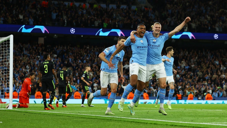 Man City ăn mừng sau khi đánh bại Real 4-0 ở bán kết mùa giải 2022-2023. Ảnh: Reuters.