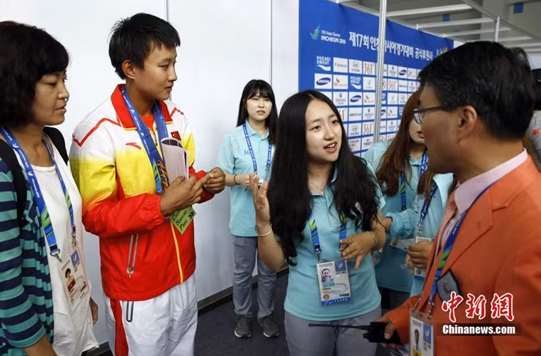 Tình nguyện viên xinh đẹp tại ASIAD 17 ảnh 2