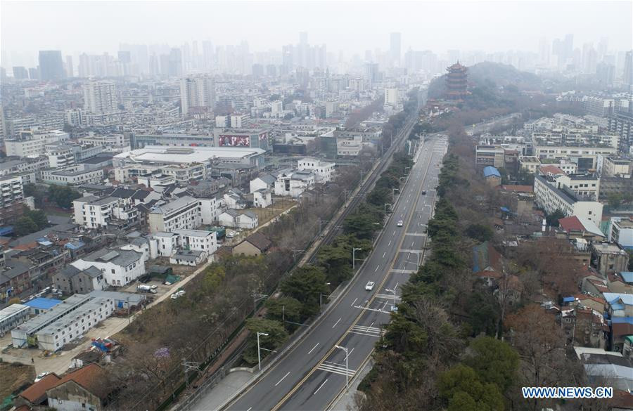 Góc nhìn ra Hoàng Hạc Lâu ở Vũ Hán, danh thắng nổi tiếng bậc nhất tỉnh Hồ Bắc. Giua trung tam dich benh, nguoi dan Vu Han thap thom chao don nam moi hinh anh 5 wuha6.jpg