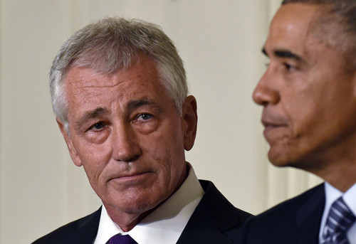 Ông Chuck Hagel và Tổng thống Mỹ Obama trong buổi công bố từ chức hôm 24/11. Ảnh: AP ha-9979-1417745172.jpg