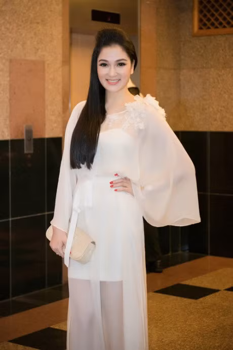 HH Nguyen Thi Huyen dep man ma sau 12 nam dang quang - Anh 11