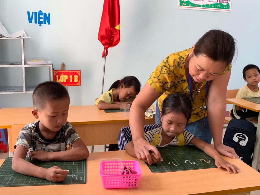 Vừa làm mẹ vừa làm thầy.