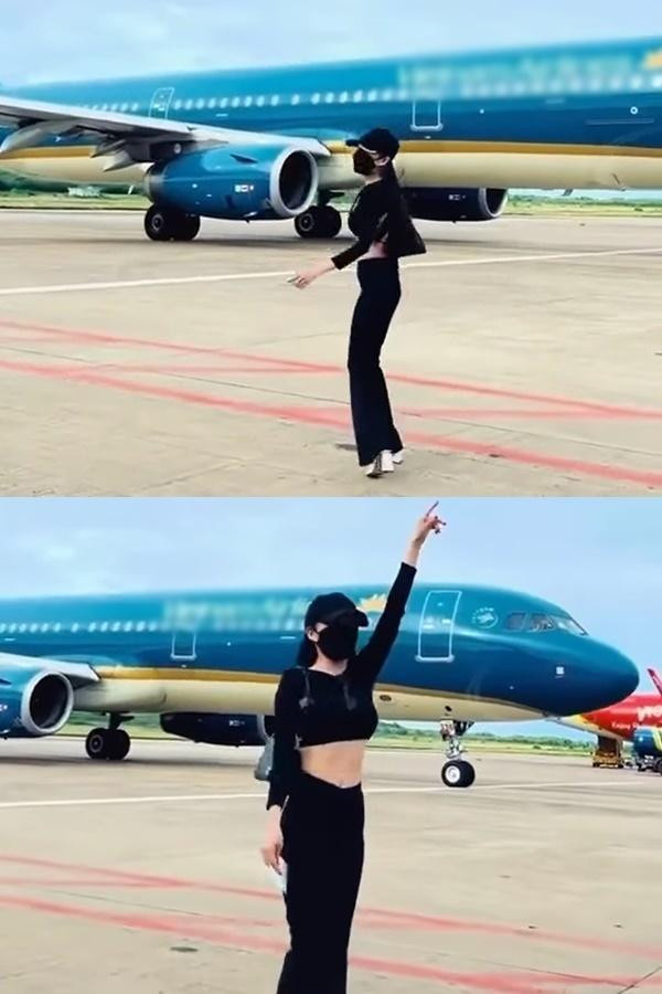 Cô gái tạo dáng khi máy bay đang di chuyển trước mặt gây xôn xao. Ảnh: Chụp màn hình FB Beatvn.