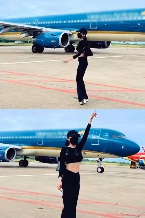 Cô gái tạo dáng khi máy bay đang di chuyển trước mặt gây xôn xao. Ảnh: Chụp màn hình FB Beatvn.