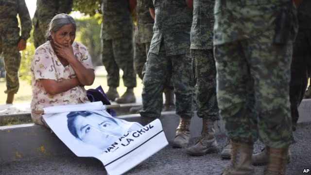 Một năm sau vụ 43 sinh viên mất tích ở Mexico: Câu hỏi vẫn chưa có lời giải - Ảnh 2 Một năm sau vụ 43 sinh viên mất tích ở Mexico: Câu hỏi vẫn chưa có lời giải - Ảnh 2