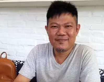 Nhạc sĩ Quốc Bảo trong buổi ra mắt sách anh viết về Mỹ Tâm hồi tháng 6. Ảnh: Phan. 