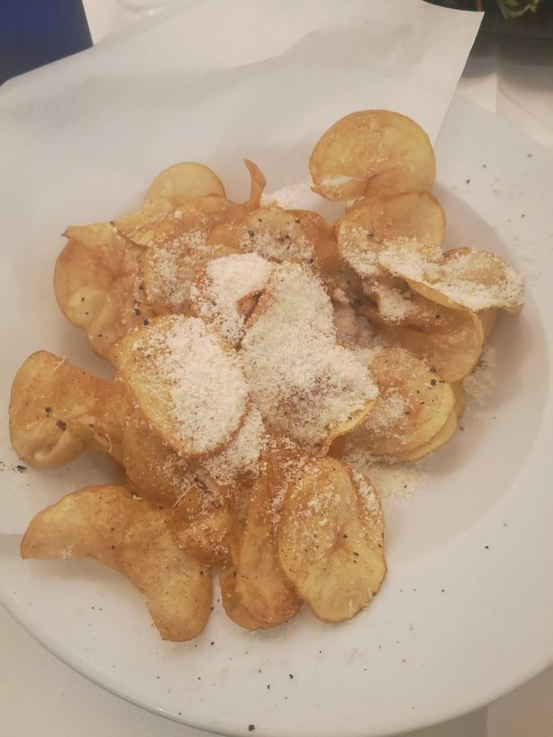 Món "khoai tây chiên phô mai" của nhà hàng Italy. Món "khoai tây chiên phô mai" của nhà hàng Italy.