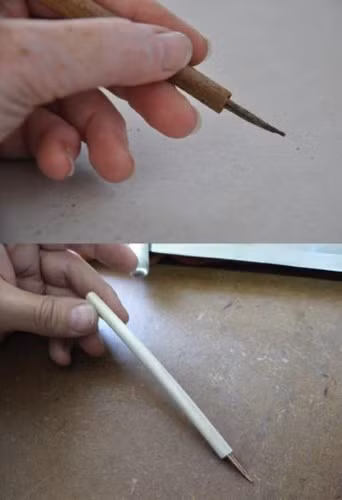 Cây bút ngàn năm tuổi (trên) và một bản sao được làm ra để xác nhận công dụng của nó.