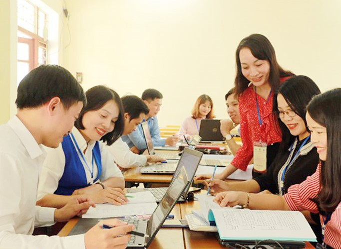 Tập huấn giáo viên và cán bộ quản lý theo mô-đun 2 các tỉnh Bắc Trung Bộ tại Trường ĐH Vinh (Nghệ An). Ảnh: IT