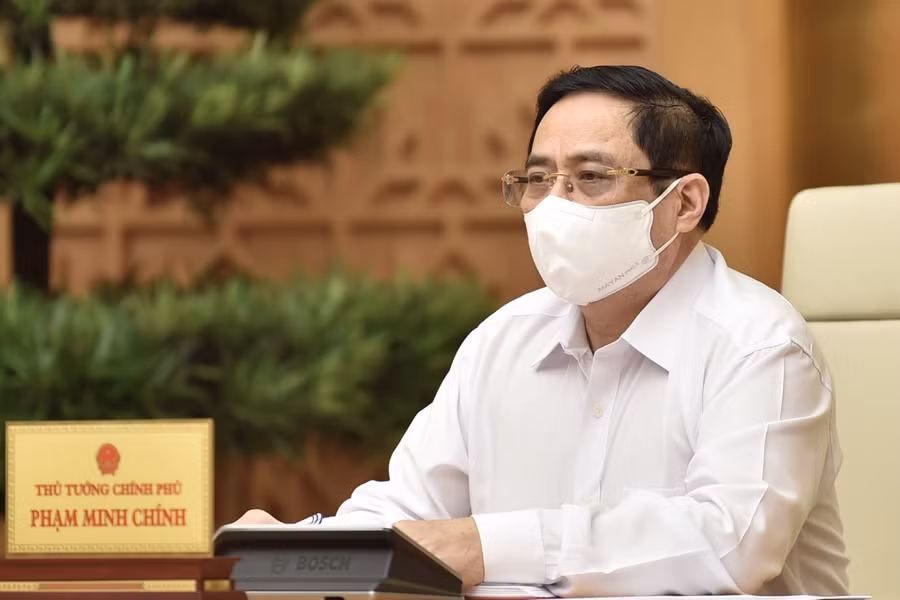 Thủ tướng Chính phủ Phạm Minh Chính triệu tập cuộc họp trực tuyến với tỉnh Bắc Giang, Bắc Ninh và các lực lượng chống dịch tại địa phương này sáng 26/5- Ảnh: VGP/Nhật Bắc.