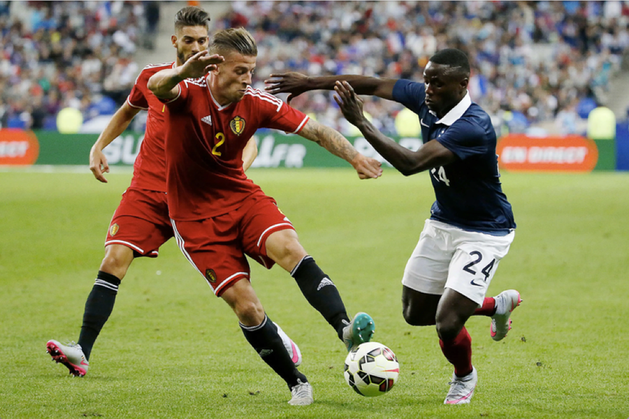 Paul-Georges Ntep (phải) trong màu áo tuyển Pháp.