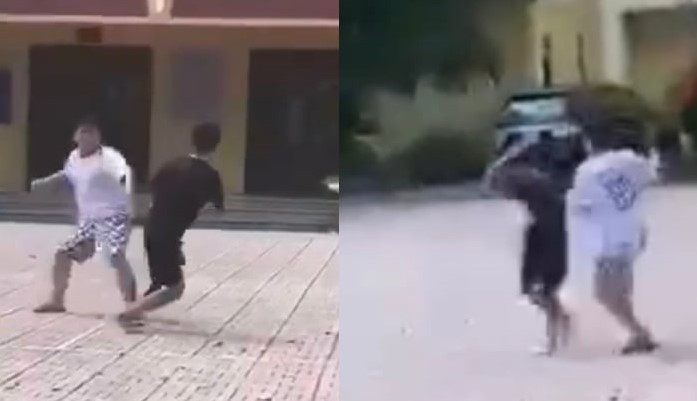 Nam sinh N.L.M (áo đen) nghi bị hành hung - (Ảnh: cắt từ video). ava-1527.jpg