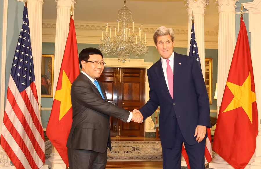 Phó Thủ tướng Phạm Bình Minh và Bộ trưởng Ngoại giao Hoa Kỳ John Kerry. Ảnh: VGP