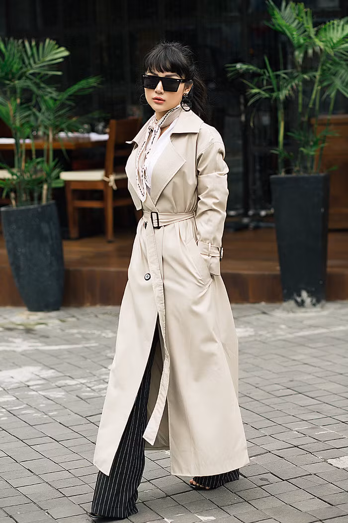 Kết hợp với chiếc áo măng tô dáng dài thời thượng, hình ảnh nấm lùn trong mắt bạn bè sẽ được xóa tan ngay.