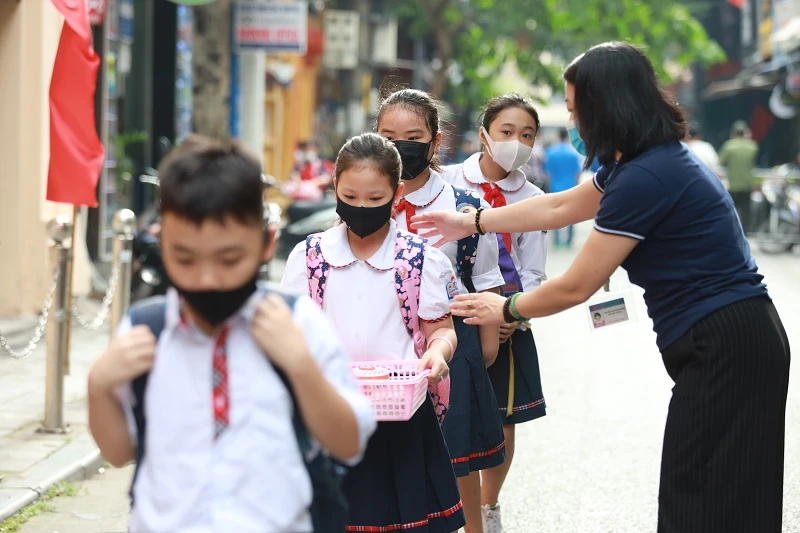 Dưới sự chỉ đạo của Bộ GD&ĐT, các trường học luôn chủ động mọi phương án phòng dịch Covid-19. Ảnh mih họa: Thế Đại