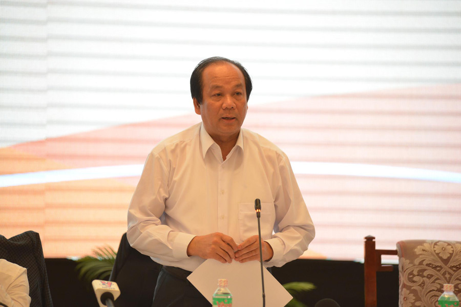 Bộ trưởng chủ nhiệm Văn phòng Chính phủ Mai Tiến Dũng trả lời báo chí. Ảnh: V. Dũng