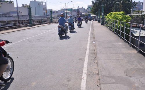 TP HCM: “Khai tử” cây cầu gần trăm tuổi, người dân tiếc nuối ảnh 11 TP HCM: “Khai tử” cây cầu gần trăm tuổi, người dân tiếc nuối ảnh 11