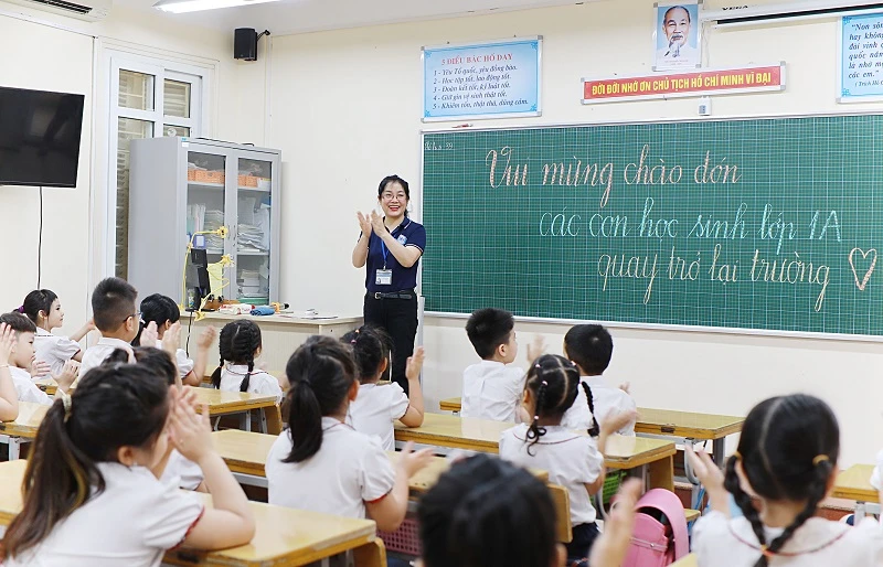 Đánh giá ngoài giúp nhà trường giải quyết các vấn đề tồn đọng và nâng cao chất lượng hoạt động giáo dục. Ảnh minh họa: Thế Đại