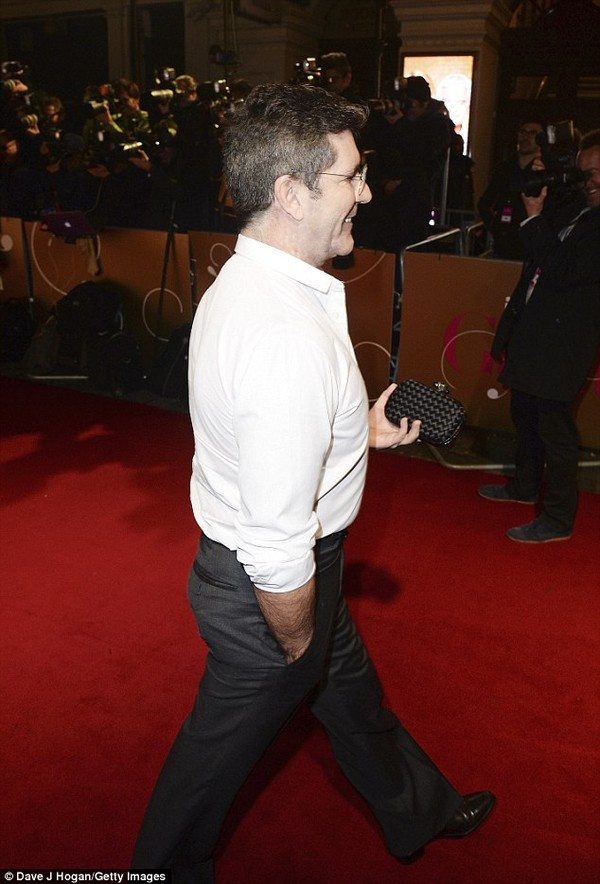 Simon Cowell quên kéo khóa quần Simon Cowell quên kéo khóa quần