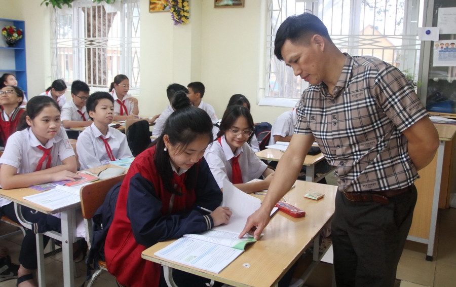 Học sinh Trường THCS Trần Phú (quận Hoàng Mai, Hà Nội) trong giờ học.