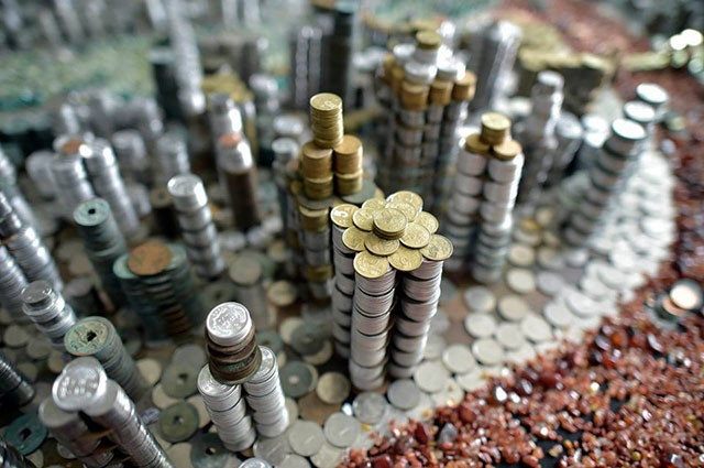 Người đàn ông dùng 50.000 đồng tiền xu để “xây” thành phố Trùng Khánh - Ảnh 1 Người đàn ông dùng 50.000 đồng tiền xu để “xây” thành phố Trùng Khánh - Ảnh 1