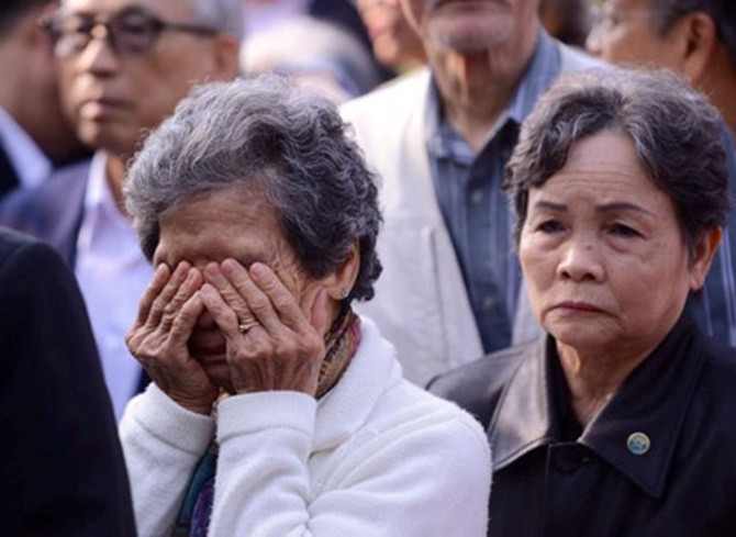 Những hình ảnh xúc động nhất trong tang lễ ông Nguyễn Bá Thanh - Ảnh 4 Những hình ảnh xúc động nhất trong tang lễ ông Nguyễn Bá Thanh - Ảnh 4