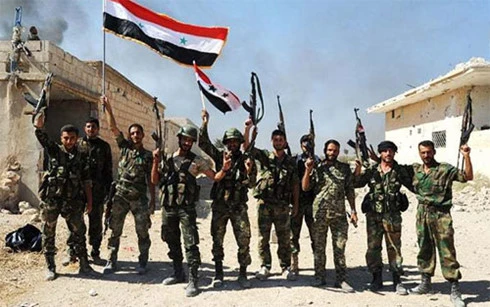 Lục quân Syria ăn mừng chiến thắng. Ảnh: Dawn.