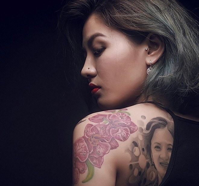 Hình xăm trên lưng của Mỹ Linh gây chú ý. Ảnh: M.M.