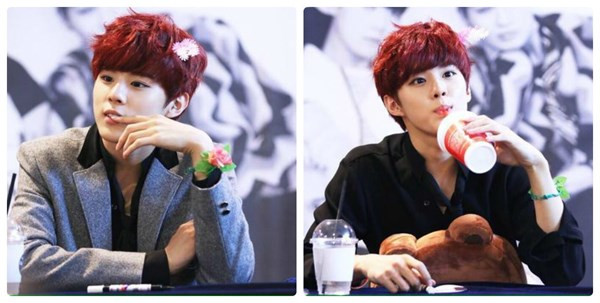 Mỹ nam Wooshin (UP10TION) không ngần ngại cài cả lông vũ và hoa trên đầu trong khi tay lại đeo vòng lá nữ tính. than tuong