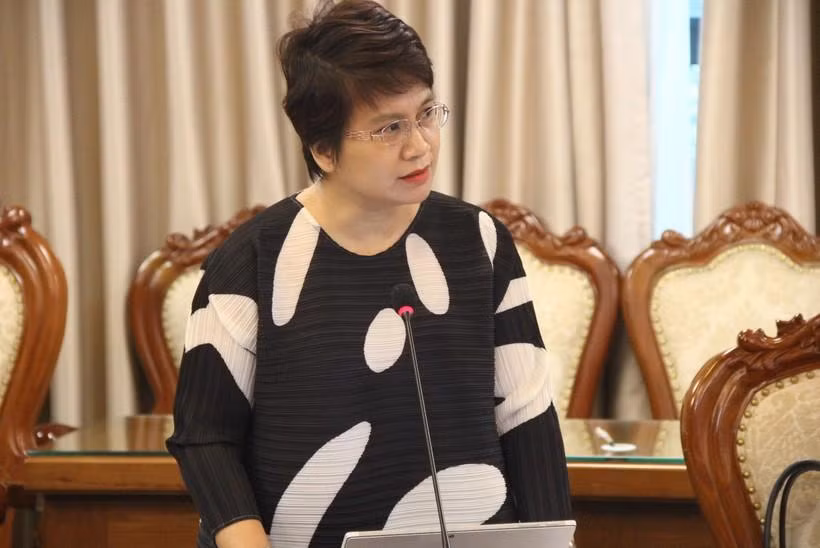 Vụ trưởng Vụ Giáo dục Đại học Nguyễn Thu Thủy báo cáo tại cuộc họp.