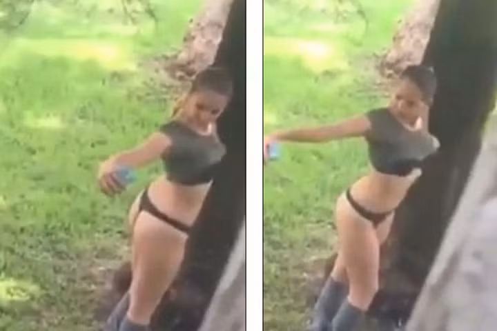 Kỳ cục cô gái đứng giữa công viên tụt quần chụp "tự sướng"