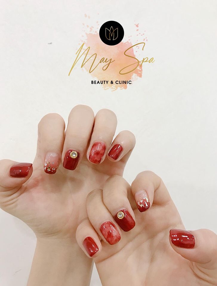 Những mẫu nail phong thủy đón tết vừa đẹp vừa sang ảnh 2 Đỏ rượu kết hợp vân đá