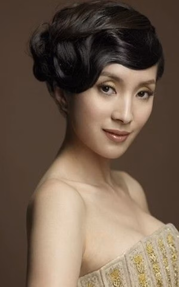 Ngắm nhan sắc mỹ nhân là “bồ chung” của chục quan tham Trung Quốc ảnh 4 Ngắm nhan sắc mỹ nhân là “bồ chung” của chục quan tham Trung Quốc ảnh 4