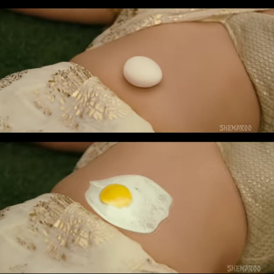 Chiên trứng trên bụng phụ nữ là cảnh quay kinh điển của Bollywood.