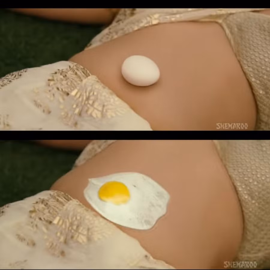 Chiên trứng trên bụng phụ nữ là cảnh quay kinh điển của Bollywood.